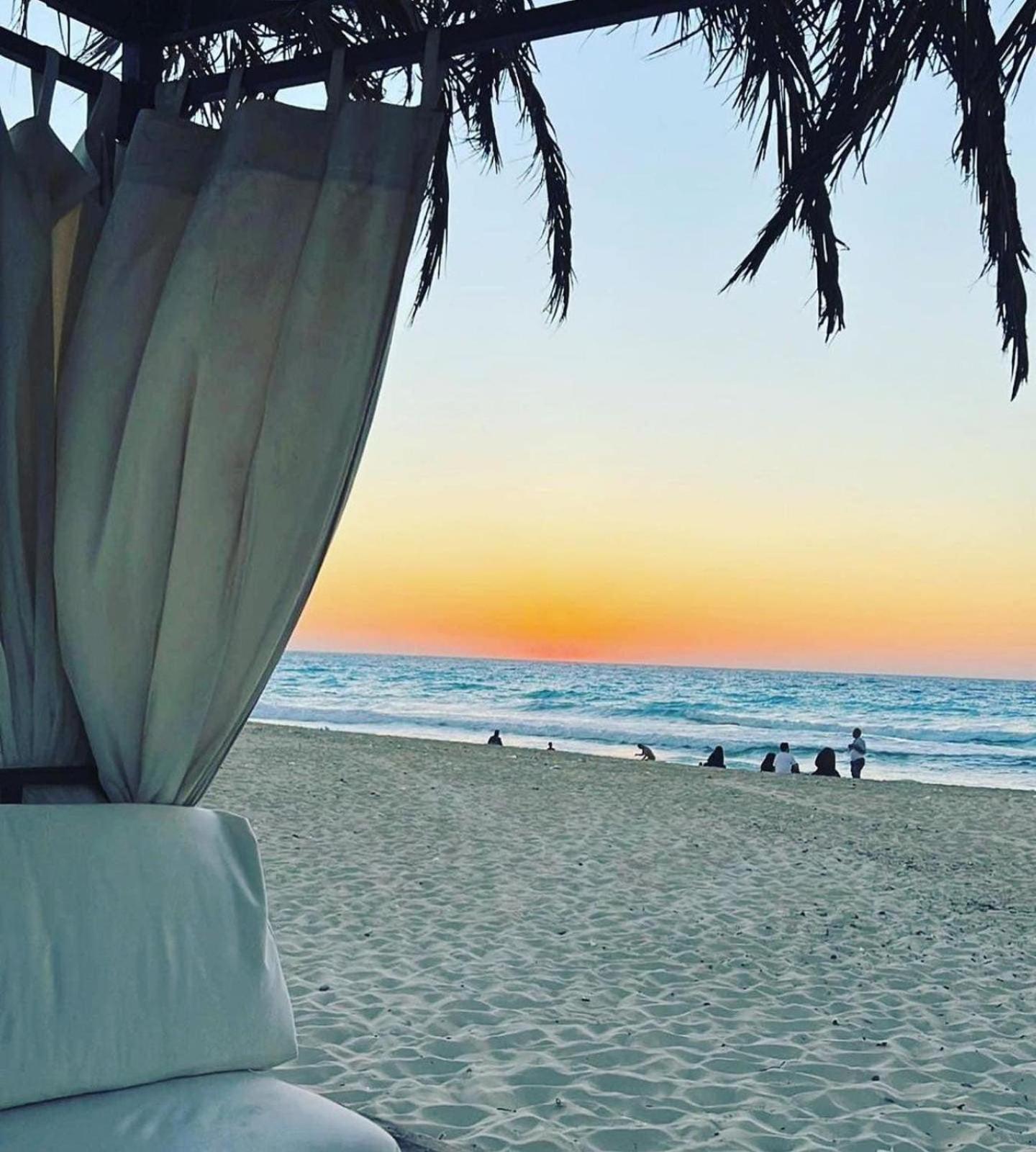 Borg El Arab Beach Resort Eksteriør billede Sunset at the beach
