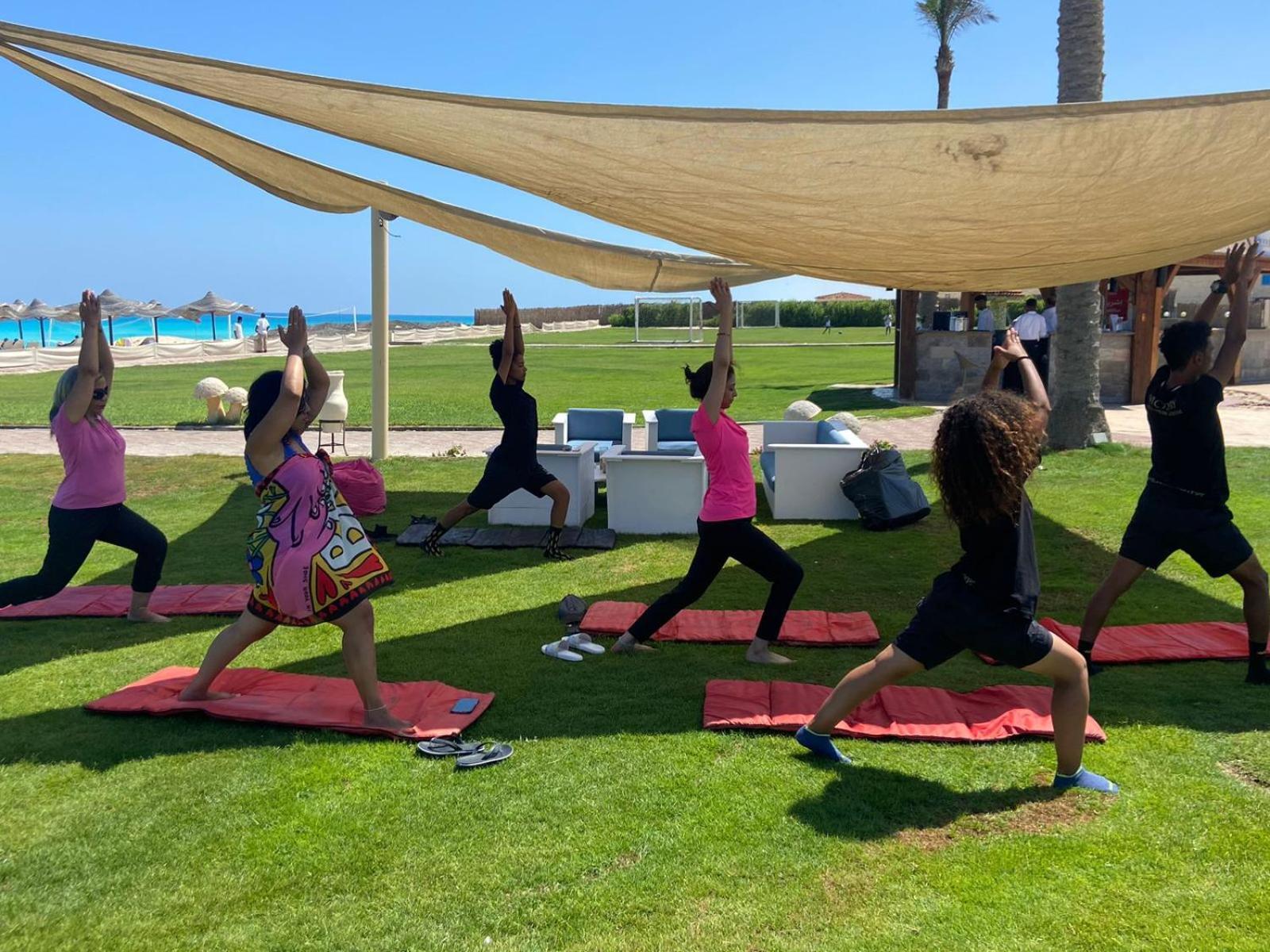 Borg El Arab Beach Resort Eksteriør billede A yoga class in Egypt