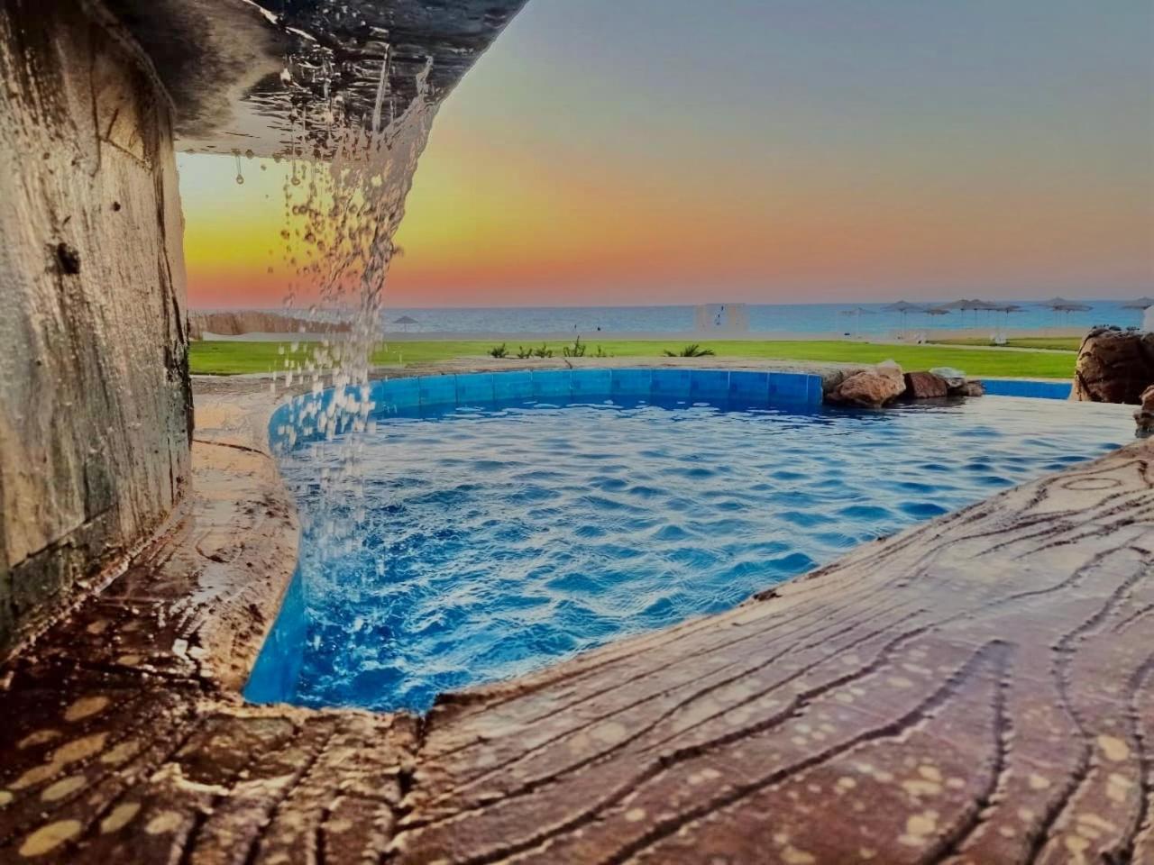 Borg El Arab Beach Resort Eksteriør billede Sunset at the beach
